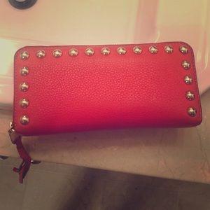 Rebecca Minkoff zip wallet orange gold studded